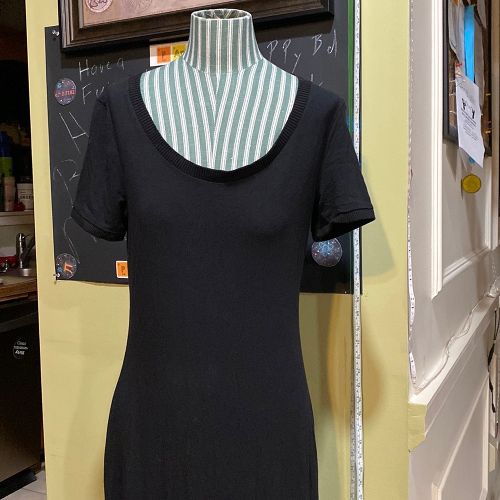 Long black cotton dress. Short sleeved, M. Very comfortable.